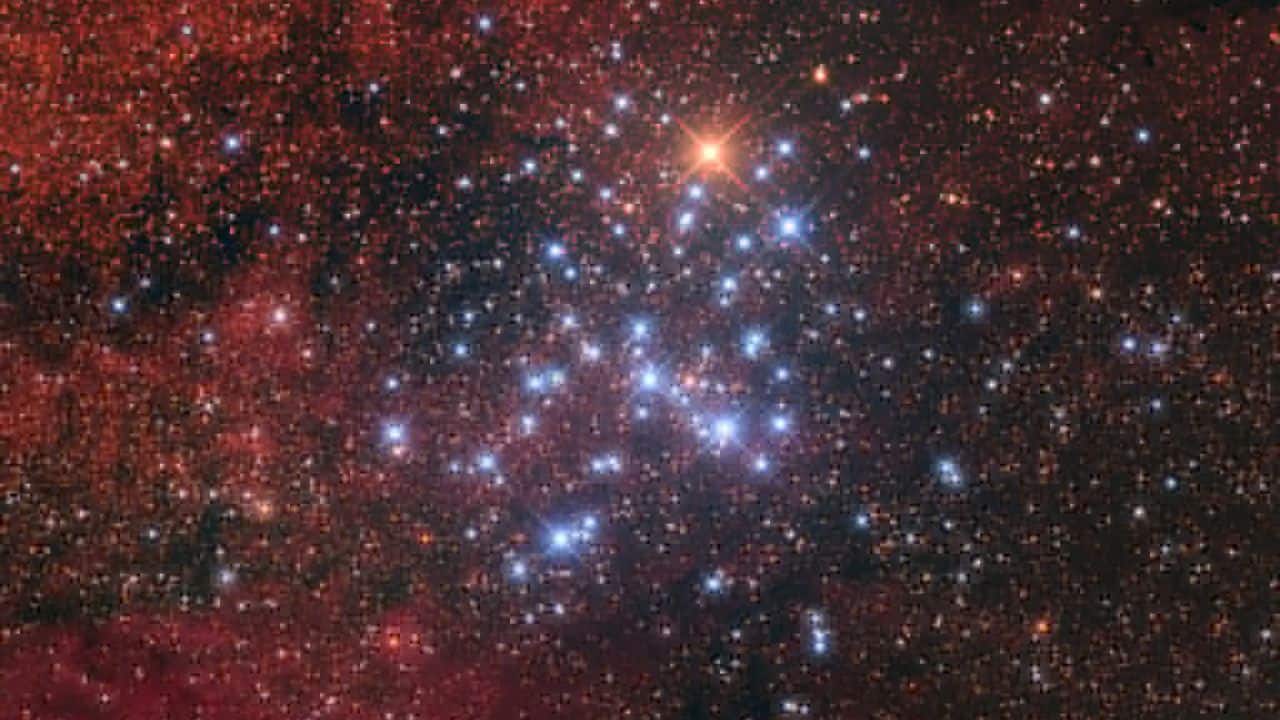 Messier 6: The Butterfly Cluster (Messier 6) is a 100-star open cluster 1,600 light-years away in Scorpius, featuring young blue stars and a striking orange K-type giant, BM Scorpii. (Image: NASA)