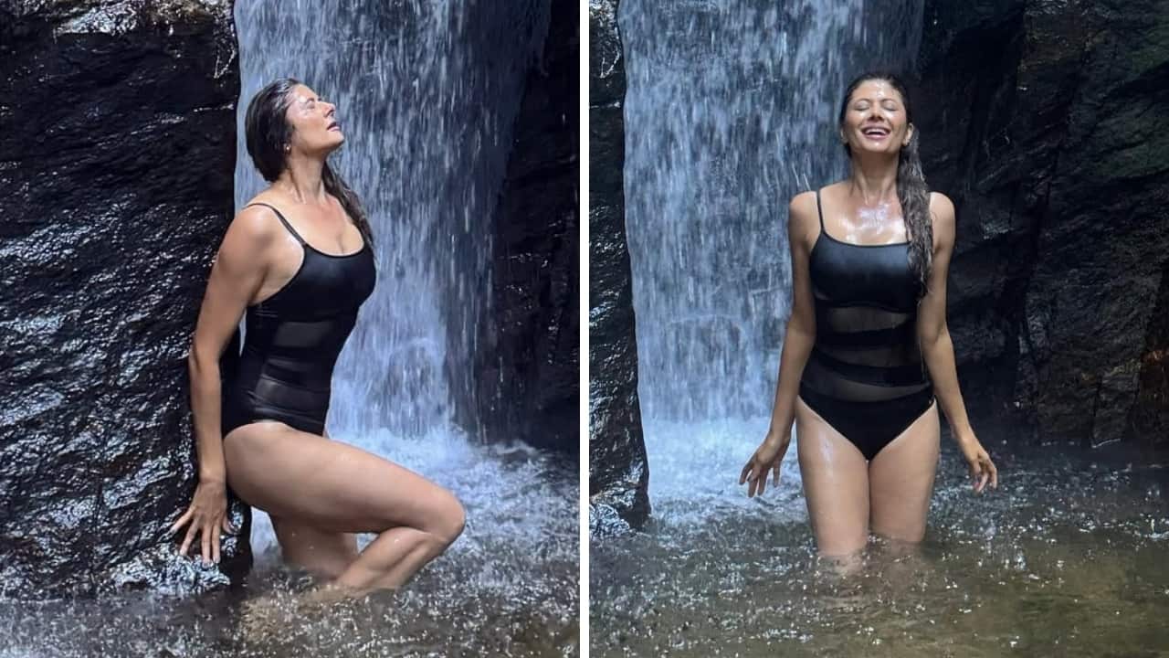 Pooja Batra rocks a black swimsuit as she enjoys waterfall in the monsoons