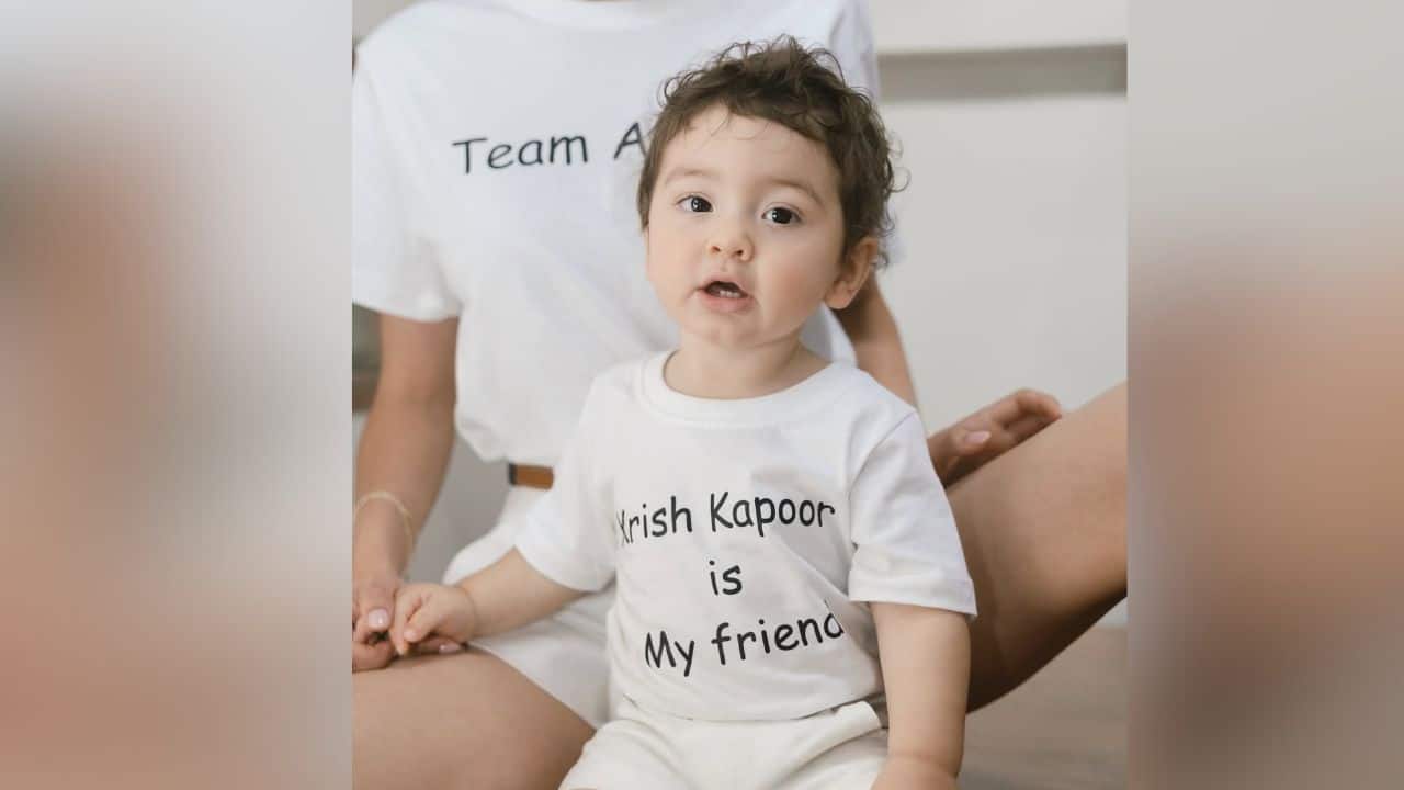 Mommy-son camaraderie  Another cute image includes a shot of Alanna posing with River seated in front, featuring his &quot;Krish Kapoor is My friend&quot; t-shirt.