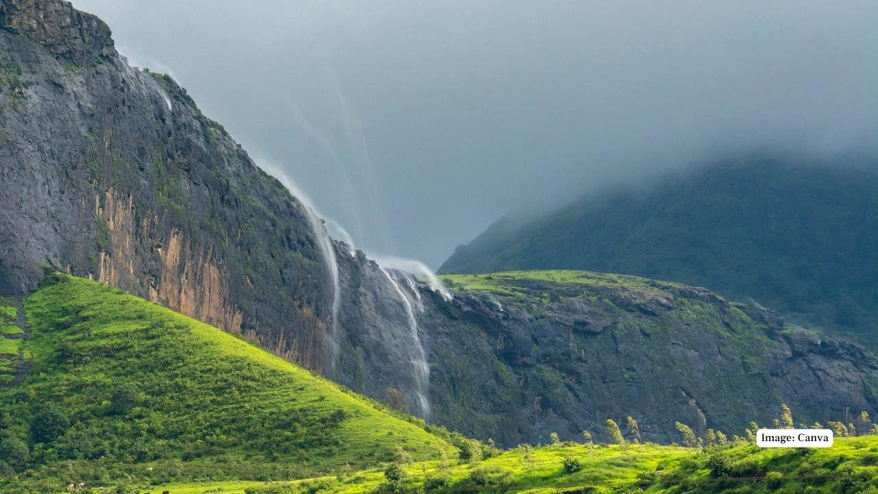 As the monsoon sweeps across India, it revives the countryside in magnificent shades of green and grey. Forests stir with new life, rivers swell with vigor, and waterfalls—nature’s most dramatic performers—take center stage. For travellers seeking beauty beyond the beaten path, this is the season to witness India’s waterfalls in their most spellbinding form. According to recent travel insights, over 51% of Indian travellers yearn for immersive natural experiences, and nearly 45% crave scenic viewpoints. If you count yourself among them, here are ten spectacular monsoon waterfalls that promise not just views, but a visceral connection to the wild. (Image: Canva)