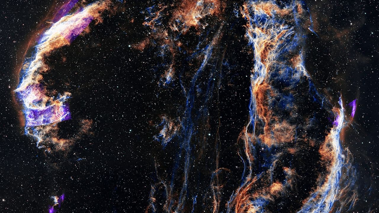 Cygnus Loop: Cygnus Loop is a supernova remnant where interstellar gas interacts with a powerful blast wave, creating a stunning display of heated material and cosmic shockwaves. (Image: NASA)
