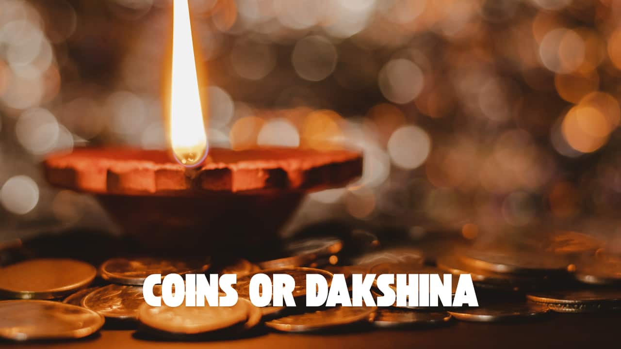 Offering coins or dakshina in the thali is a way of showing respect and gratitude to the divine and seeking blessings of abundance. (image: canva)