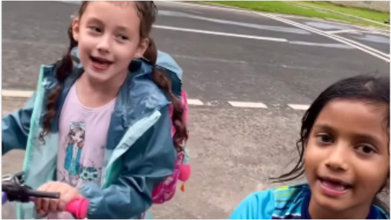 Russian girl, Indian friend go viral singing Kannada poem while cycling in Bengaluru. Watch