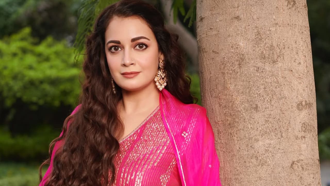 Sophisticated Her footwear choice—gold high-heeled sandals—ties the look together, echoing the golden accents of her attire. The heels elongate her silhouette, adding poise and sophistication while seamlessly blending with the colour palette of the ensemble. Sophisticated Her footwear choice—gold high-heeled sandals—ties the look together, echoing the golden accents of her attire. The heels elongate her silhouette, adding poise and sophistication while seamlessly blending with the colour palette of the ensemble.