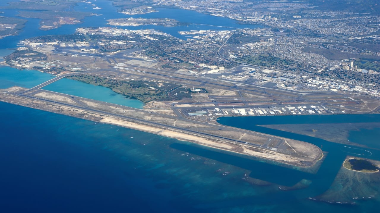 10. Daniel K. Inouye International Airport, USA Located in Honolulu, this runway is surrounded by palm trees, volcanic mountains, and sparkling Pacific waters — a tropical paradise from the moment you arrive. (Image: Wikipedia)