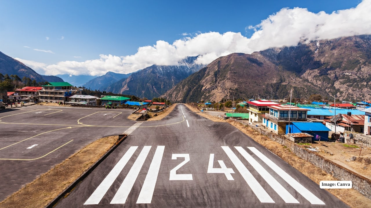 10. Lukla Airport, Nepal Known as the gateway to Everest, Lukla’s runway is perched on a steep mountain slope. The dramatic Himalayan backdrop makes this one of the most awe-inspiring landings in the world. (Image: Canva)