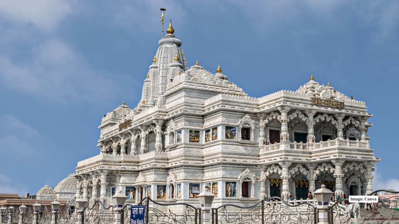 3. Prem Mandir Known for its dazzling white marble architecture, Prem Mandir glows at night during Janmashtami with colourful lighting, fountains, and devotional scenes depicting Krishna’s life, drawing photographers and pilgrims alike. (Image: Canva)