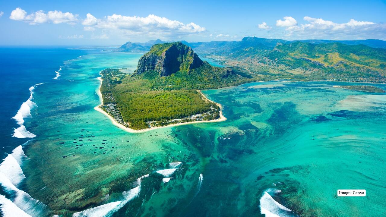 8. Mauritius An island paradise with white sand beaches, coral reefs, and lush mountains. Hike Black River Gorges, explore colourful markets, and enjoy water sports. Mauritius blends natural beauty and cultural diversity, making it a relaxing yet activity-filled long weekend escape. (Image: Canva)