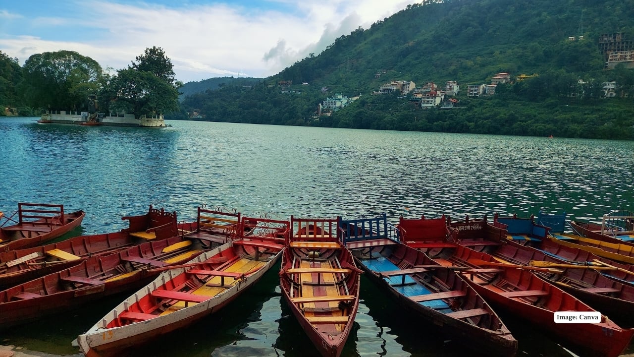 Nainital A scenic lake town with boating, cable car rides, and mountain viewpoints. Enjoy cool breezes, cosy cafes, and lakeside walks—perfect for escaping Delhi’s heat and chaos over a relaxed weekend. (Image: Canva)