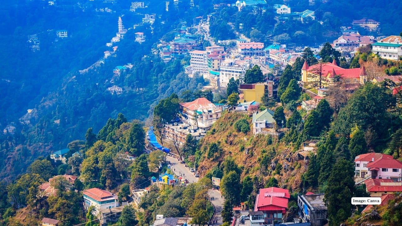 Mussoorie Known as the “Queen of Hills,” Mussoorie offers misty mornings, Mall Road strolls, and Kempty Falls. Perfect for a quick mountain getaway with panoramic Himalayan views and cool weather almost year-round. (Image: Canva)