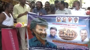 Fans perform pooja for Coolie success