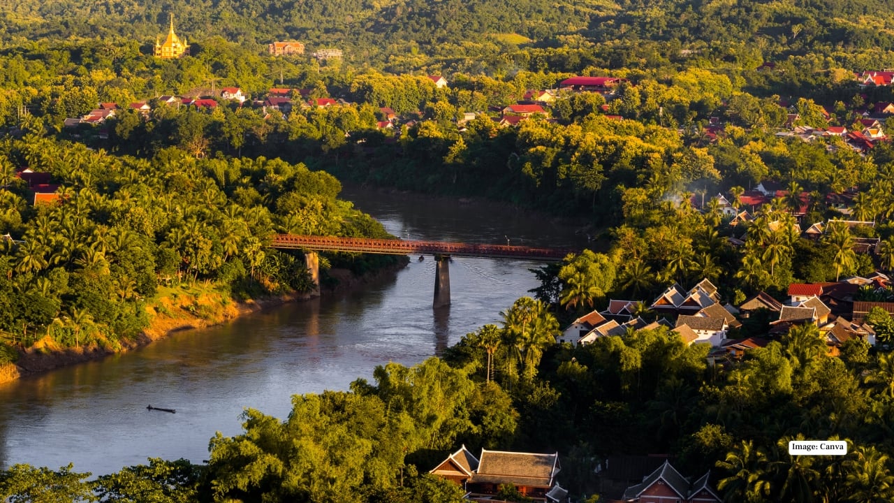 2. Luang Prabang – UNESCO World Heritage city famous for golden temples, French colonial architecture, and the mesmerizing daily alms-giving ceremony. Explore the night market for handicrafts and street food. (Image: Canva)