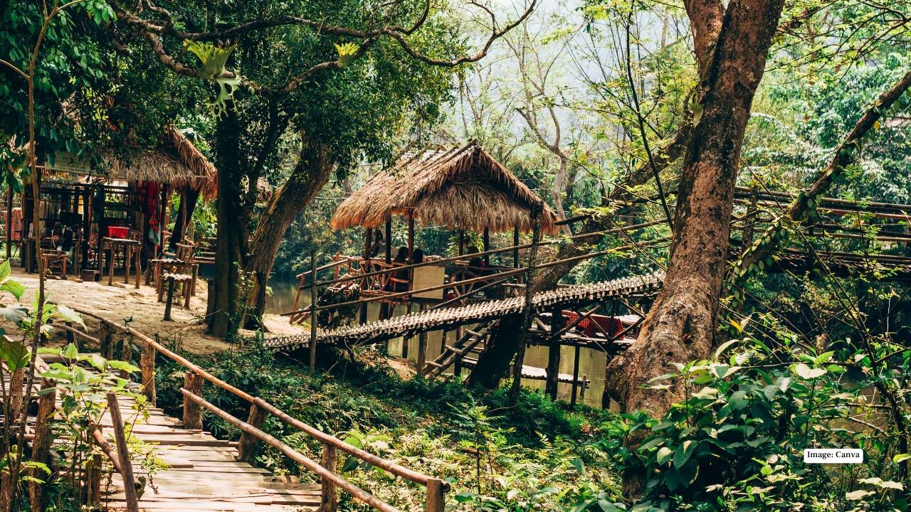10. Muang Ngoi Neua – A remote village accessible only by boat. Experience traditional stilt houses, peaceful hiking trails, and authentic Lao village life far from tourist crowds. (Image: Canva)