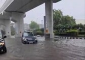 Delhi rain: BMW gets stranded in flooded road. Video