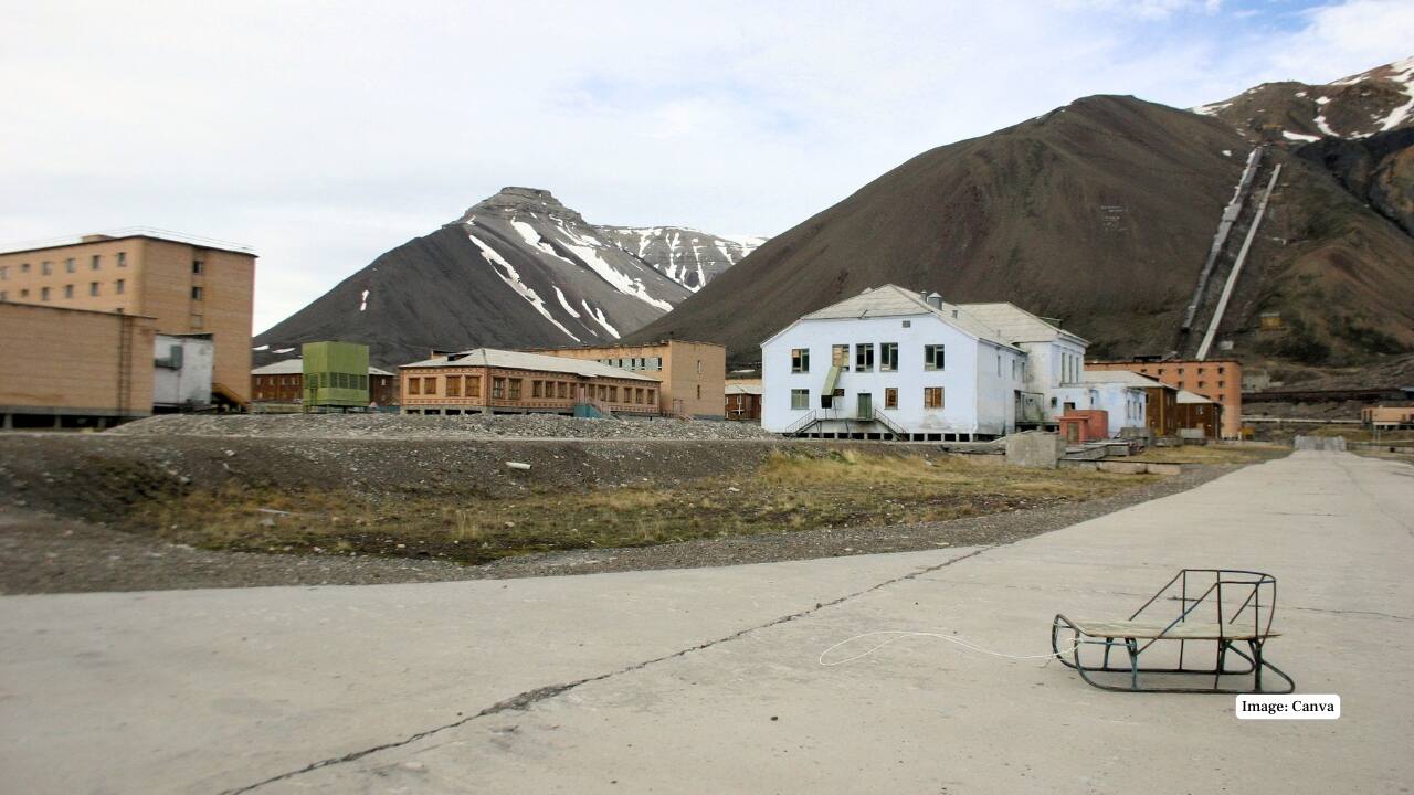 8. Pyramiden, Norway This Arctic settlement was a Soviet coal-mining town on Svalbard. Abandoned in 1998, it remains remarkably preserved, complete with a swimming pool, cultural centre, and Lenin statue under the midnight sun. (Image: Canva) 8. Pyramiden, Norway This Arctic settlement was a Soviet coal-mining town on Svalbard. Abandoned in 1998, it remains remarkably preserved, complete with a swimming pool, cultural centre, and Lenin statue under the midnight sun. (Image: Canva)