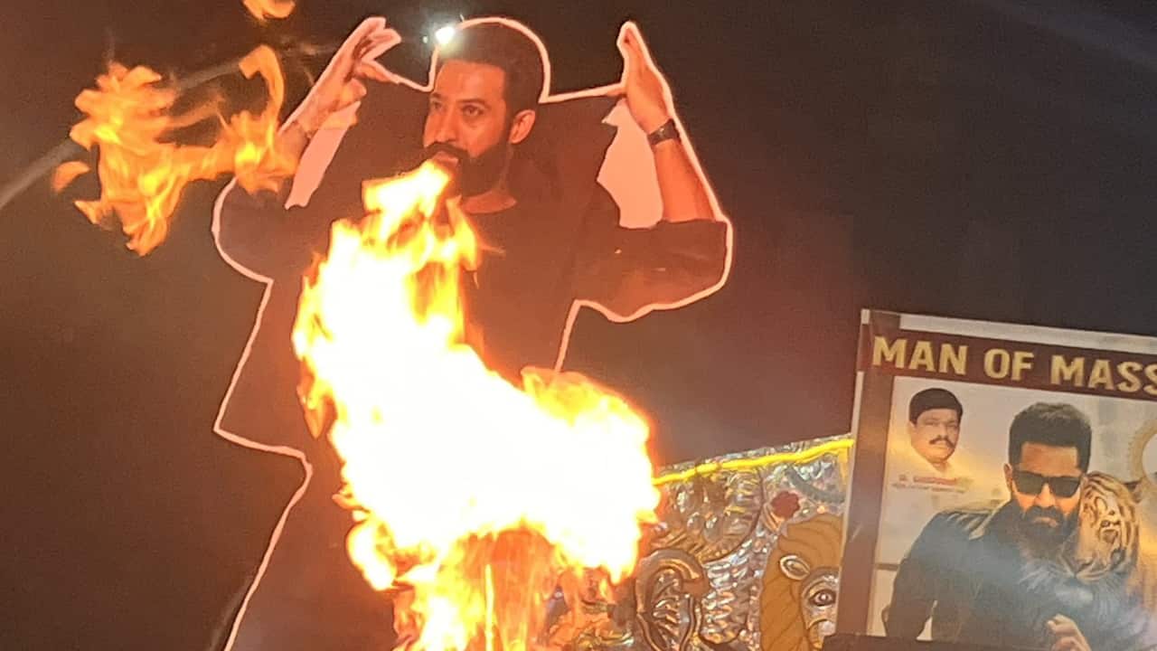 Street party NTR fans bring the festivity onto the streets, converting public areas into open-air dance floors. With DJs playing hit numbers, crowds danced with unbridled energy, waving flags and banners. The scene was more like a fest than a movie release, capturing the charge of Jr NTR's fan following. Street party NTR fans bring the festivity onto the streets, converting public areas into open-air dance floors. With DJs playing hit numbers, crowds danced with unbridled energy, waving flags and banners. The scene was more like a fest than a movie release, capturing the charge of Jr NTR's fan following.