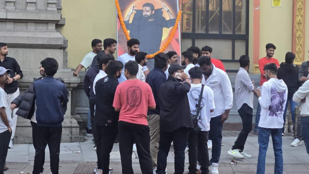 Sacred beginning Ahead of the first show, devoted admirers performed elaborate poojas, offering flowers, incense, and prayers in front of the huge cutouts of Jr NTR. The celebrations marked the early success of the film and the actor’s entry into Bollywood. Sacred beginning Ahead of the first show, devoted admirers performed elaborate poojas, offering flowers, incense, and prayers in front of the huge cutouts of Jr NTR. The celebrations marked the early success of the film and the actor’s entry into Bollywood.