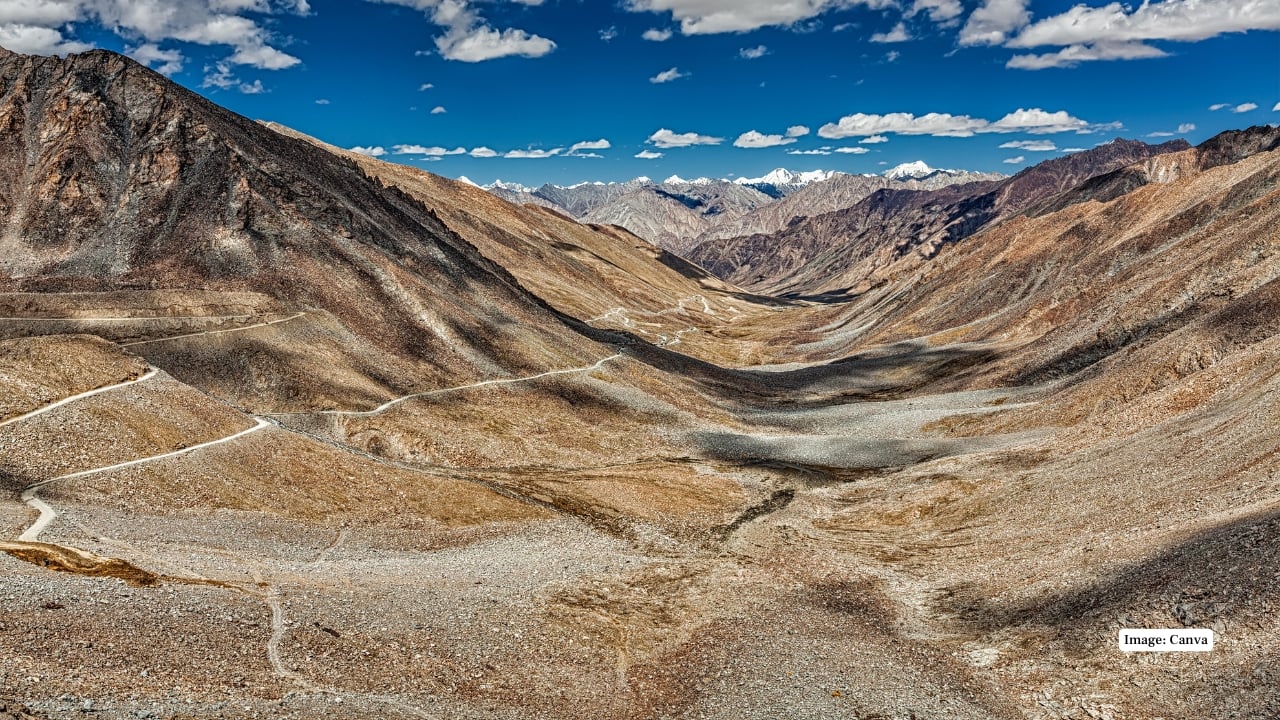 Karakoram Pass Steeped in history, the Karakoram Pass connects Ladakh with China’s Xinjiang region. Its remote location, stark landscapes, and extreme weather make it a rare, once-in-a-lifetime crossing for true explorers. (Image: Canva)