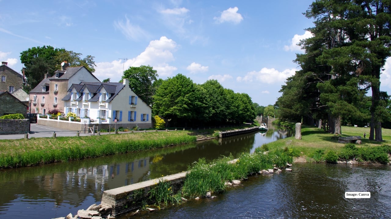 2. Malestroit (Morbihan, Brittany) Nestled along peaceful canals, Malestroit enchants with its medieval stone houses, narrow cobbled lanes, and vibrant markets. The village radiates classic Breton charm, perfect for cultural exploration and riverside strolls. (Image: Canva)