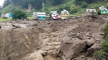 Houses were damaged after a cloudburst in Kishtwar. (PTI photo)
