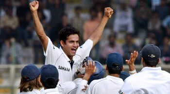 Irfan Pathan celebrates with teammates after claiming Test hat-trick against Pakistan in Karachi