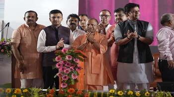 Torrent Group director Jinal Mehta with UP CM Yogi Adityanath