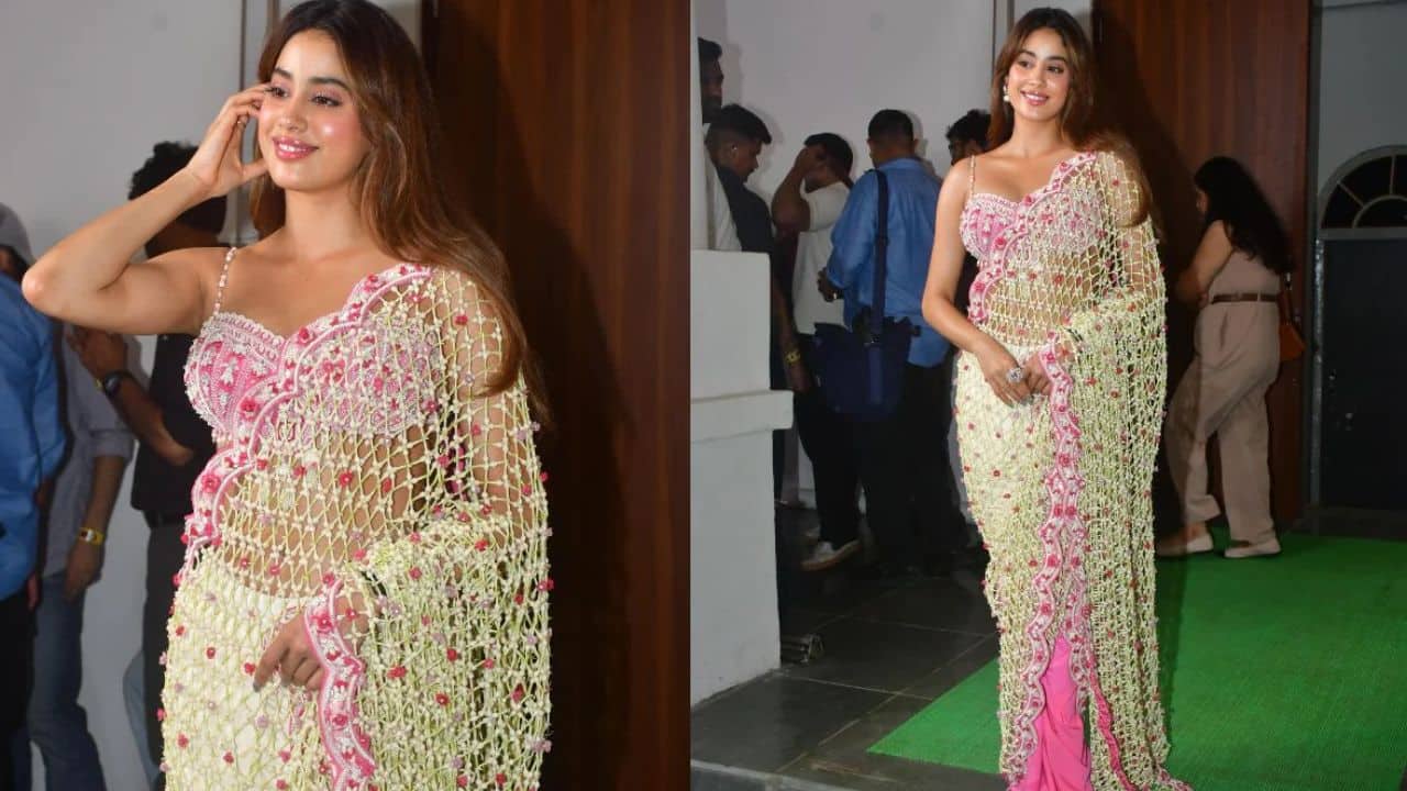 Net Saree with Beaded Detailing Janhvi dazzles in a modern net saree with intricate bead and pearl embroidery. The pink undertone and statement blouse give the look a playful yet chic vibe, ideal for parties.