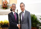 China, India should regard each other as partners, not rivals, says Wang Yi