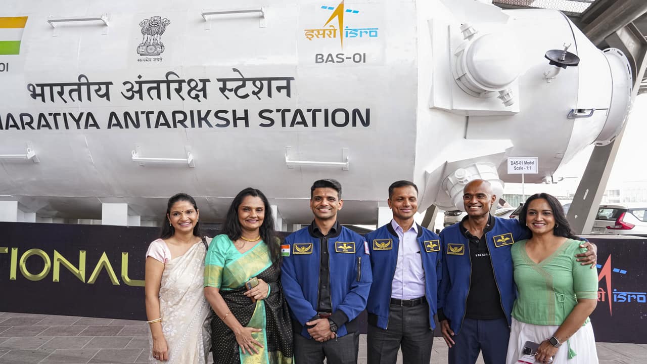 Group Captain Shubhanshu Shukla, Group Captain Prasanth Balakrishnan Nair and Group Captain Ajith Krishnan with others during the unveiling of first look of the Bharatiya Antriksh Station (BAS) on the occasion of the National Space Day, at Bharat Mandapam, in New Delhi