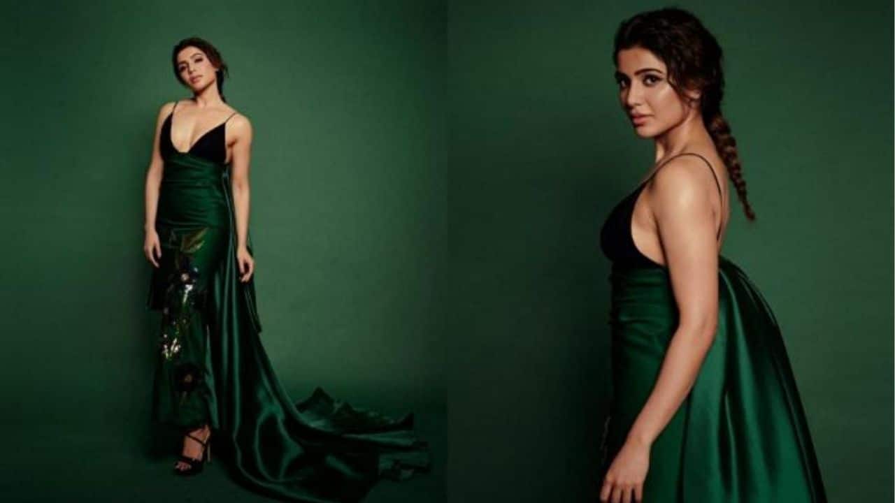 Green Satin Glam Closing with a luxe emerald-green gown featuring a dramatic trail, Samantha looks regal and commanding. The plunging neckline and glossy satin fabric add allure, while the braid keeps the overall look elegant and grounded.