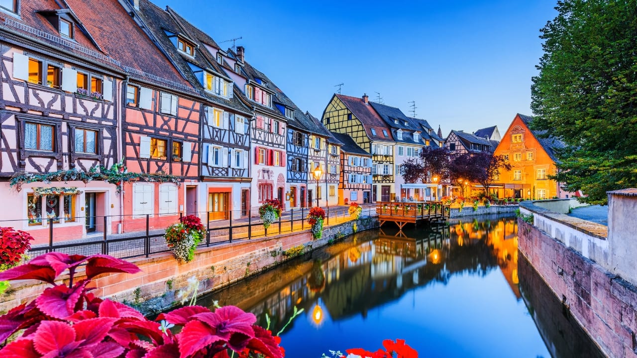 1. Colmar, France Nestled in Alsace, Colmar enchants with pastel-colored, half-timbered houses, cobbled streets, and delicate canals reminiscent of “Little Venice.” Flower-lined windows and lively heritage make each stroll feel magical. (Image: Canva)