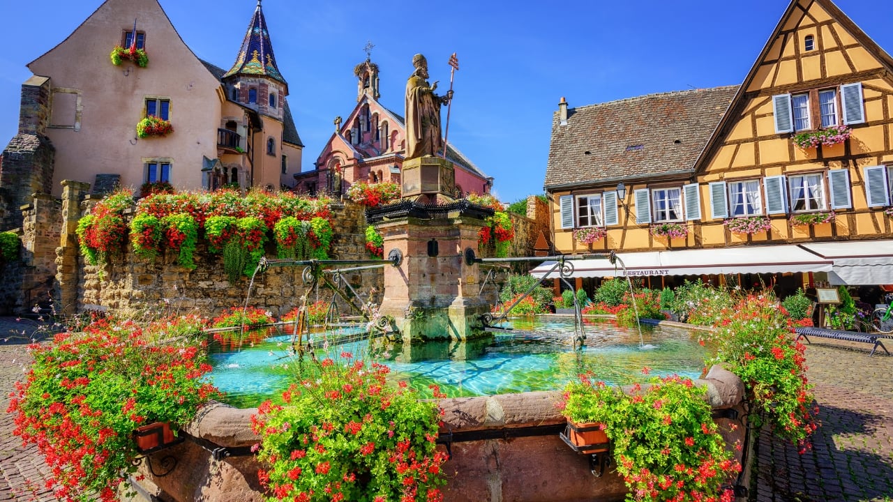 4. Eguisheim, France This circular medieval village radiates charm with its flower-draped, half-timbered homes, car-free lanes, and graceful arches. A perfect blend of history, wine, and whimsy in Alsace. (Image: Canva)