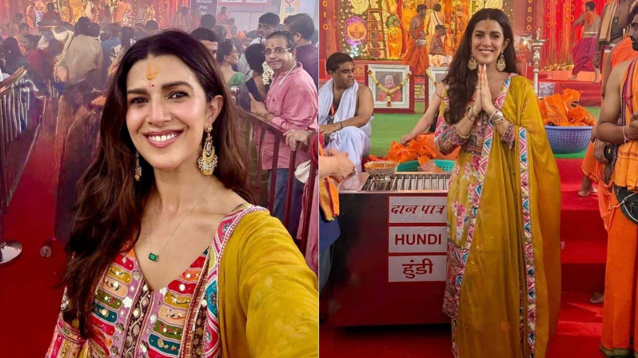 Nimrat Kaur Nimrat Kaur’s Ganpati look is vibrant and traditional, perfectly blending elegance with festive spirit. She wears a stunning multicolored kurta featuring intricate embroidery and mirror work, paired with a mustard yellow dupatta that adds a rich contrast. Her jewelry includes large, ornate jhumkas and a delicate emerald pendant, enhancing her ethnic charm. The traditional tilak on her forehead complements her radiant smile, making her look both graceful and joyous for the occasion.