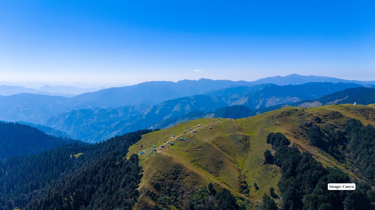 1. Jibhi: A Hidden Hamlet in Tirthan Valley Tucked in Himachal’s Tirthan Valley, Jibhi is a quiet mountain village surrounded by pine forests, streams, and traditional wooden houses, perfect for travellers seeking peace and rustic charm. (Image: Canva)
