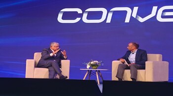 Infosys co-founder Nandan Nilekani at Walmart's annual event Converge, alongwith Walmart's CTO Suresh Kumar.