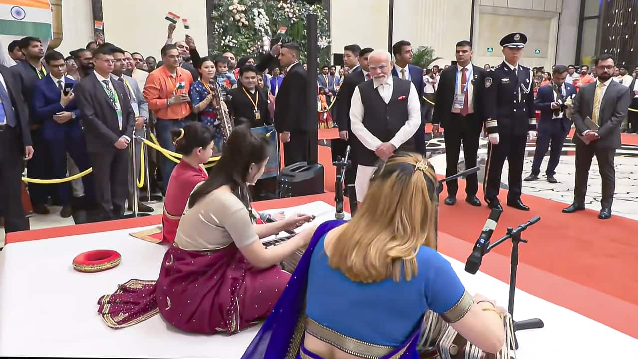 Prime Minister Narendra Modi being welcomed with a performance by artistes upon his arrival, in Tianjin, China. 