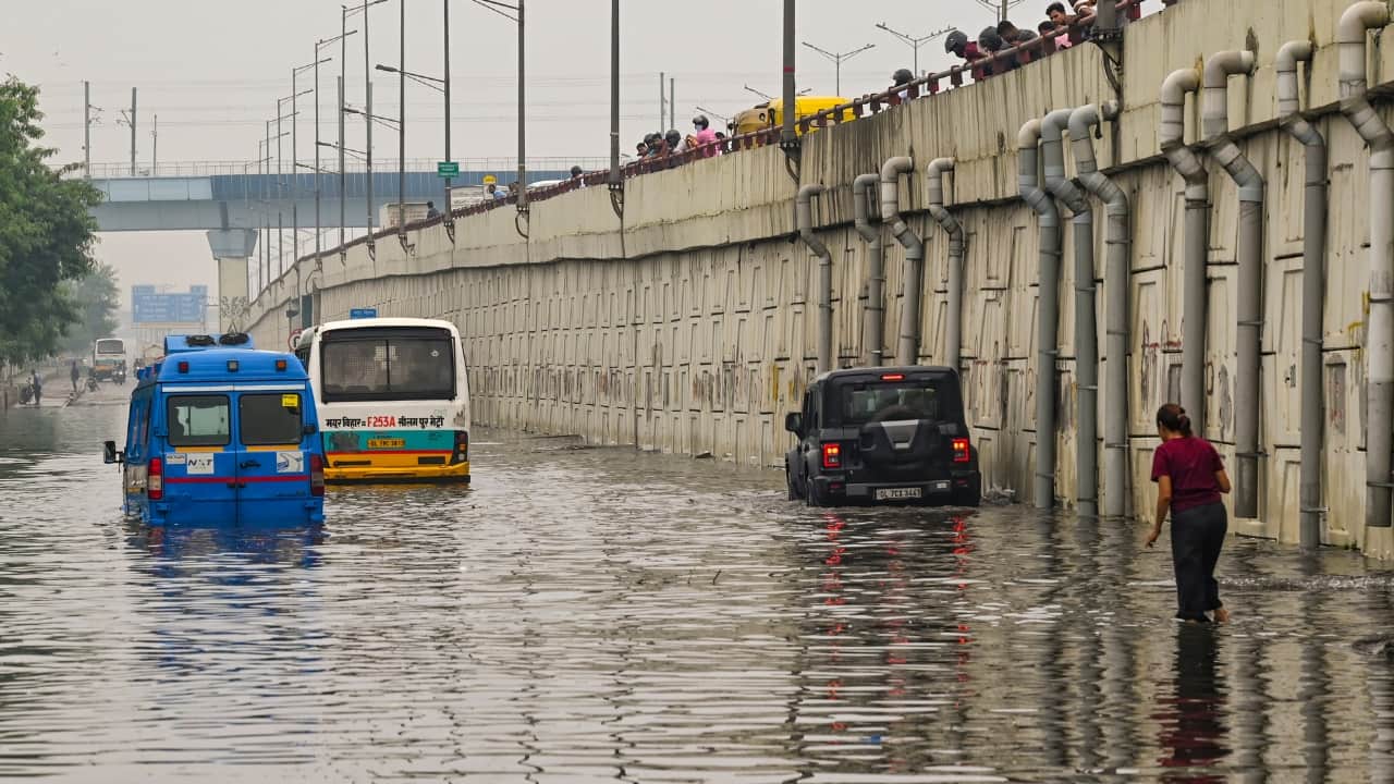 Waterlogging, traffic jams, and power cuts bring the Capital to a standstill. (Image: PTI)