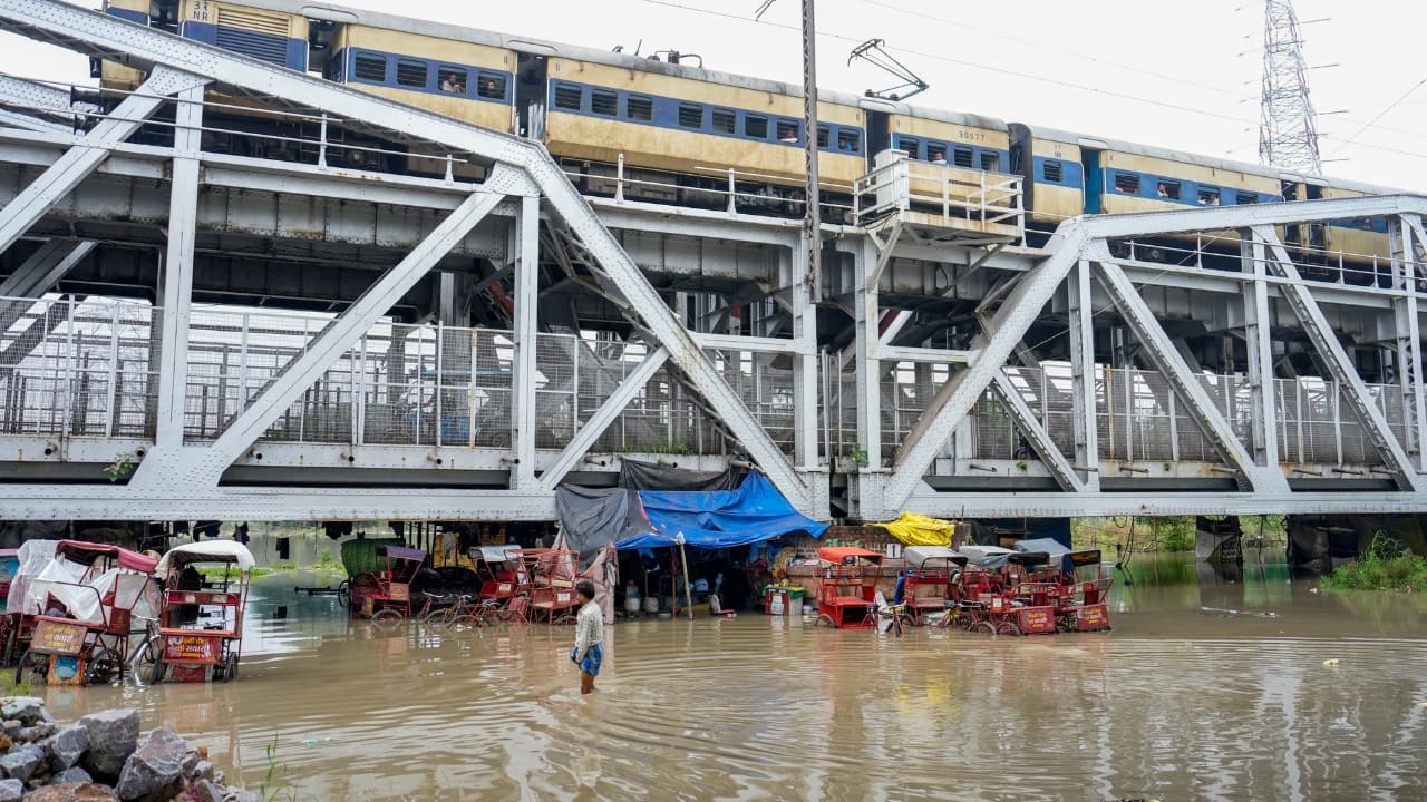 Delhi reels under heavy showers as IMD warns of more rain; Yamuna nears danger mark. (Image: PTI)