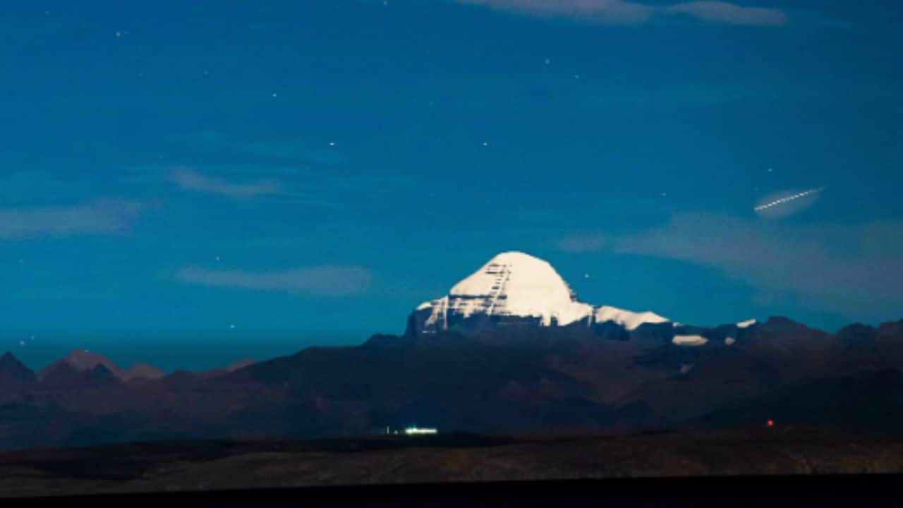 IRS Officer photographs Mount Kailash shining under stars with Lake Mansarovar reflecting like heaven