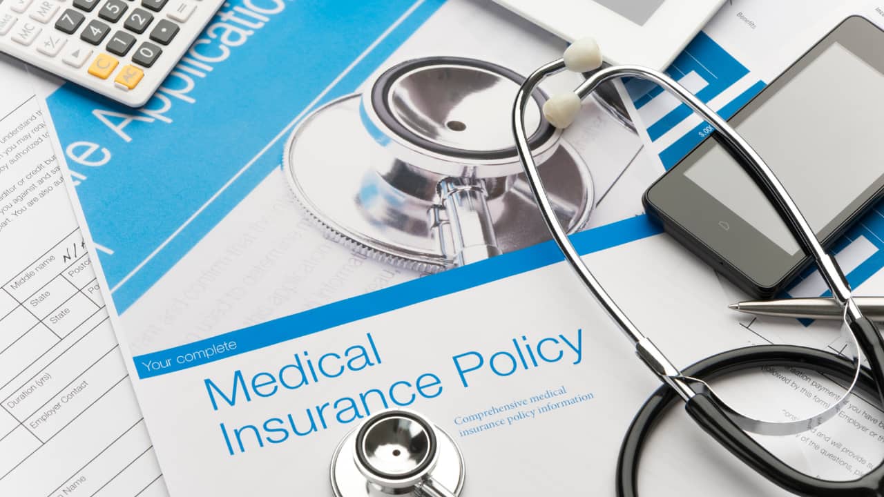 Can you lower your health insurance premiums by reducing the base sum insured?