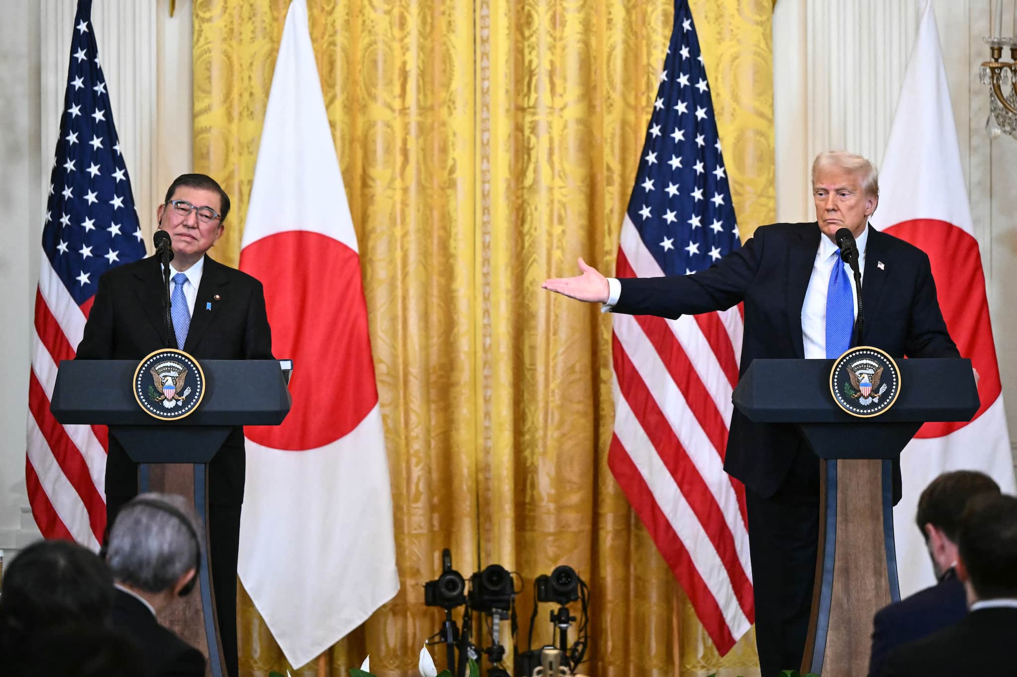 Trump signs executive order to enforce US-Japan trade deal, slashes auto tariffs to 15%