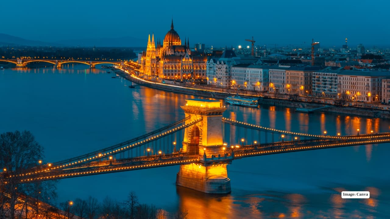 8. Budapest, Hungary Happiness bubbles up—quite literally—in Budapest. Thermal baths steam in the morning air, bridges arch gracefully across the Danube, and evenings hum with ruin bars and riverside strolls. The city’s affordability makes indulgence easy, while its natural rhythm restores balance. (Image: Canva)