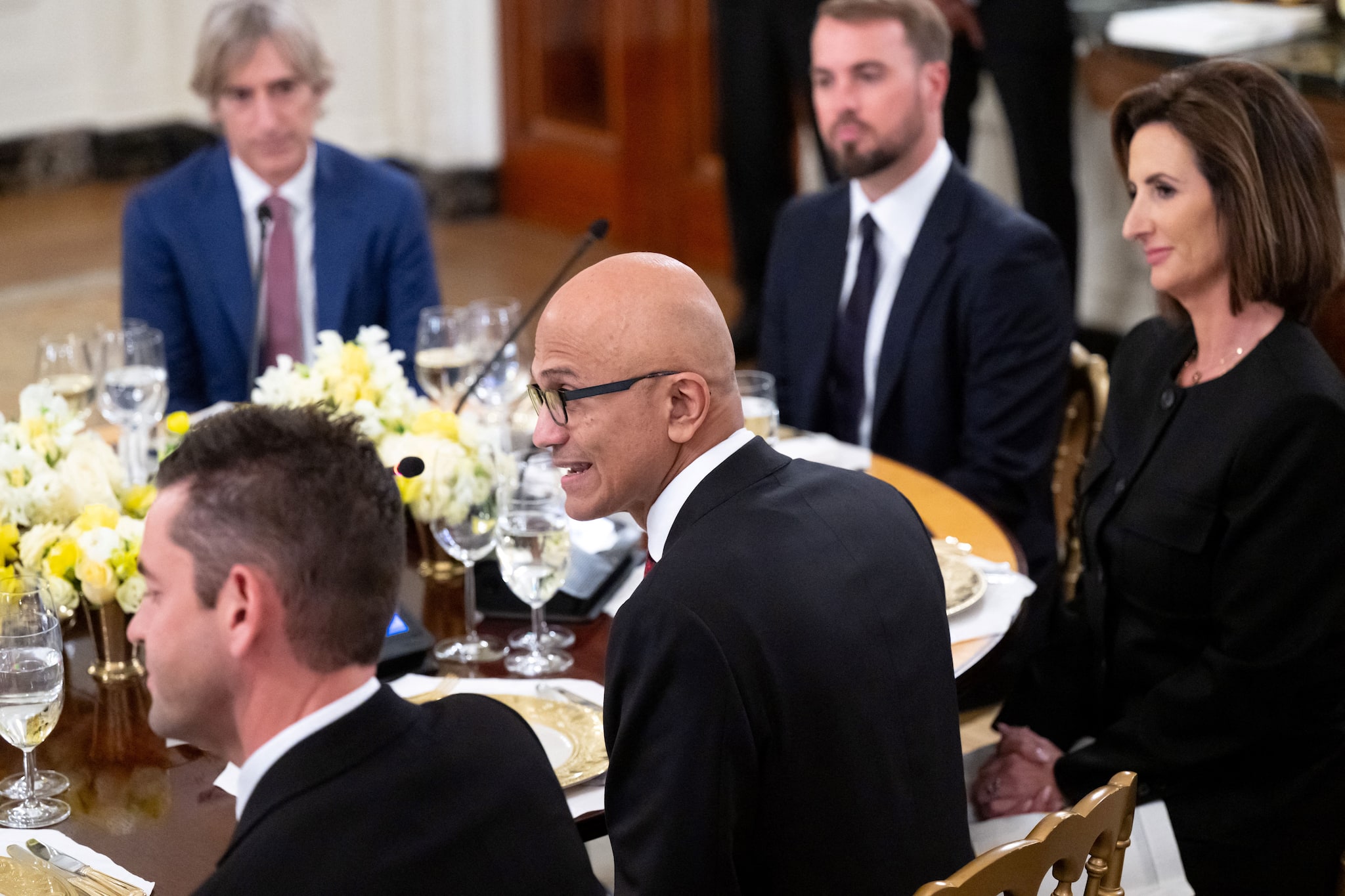 Microsoft CEO Satya Nadella credited Trump’s policies for enabling global trust in American technology and confirmed Microsoft invests USD 75–80 billion annually in the US. Trump praised Nadella’s leadership, noting Microsoft’s stock surge from USD 28 to over USD 500, while Nadella thanked the First Lady for her focus on AI-related skilling. (AFP) 