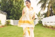 Mouni Roy stuns in traditional white and golden saree on Onam, See pics