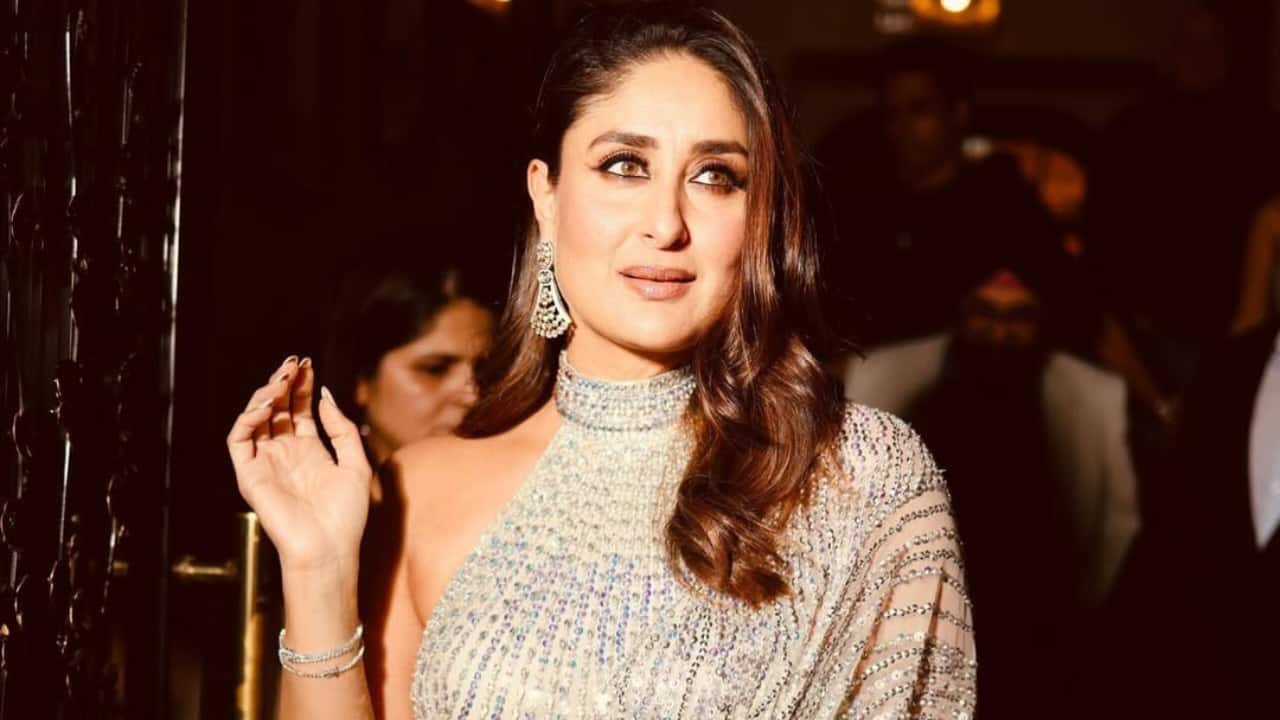 Statement sparkle Kareena opted for bold diamond jewellery to add flair to her saree. Her shimmery outfit was perfectly complemented by a striking choker necklace and drop earrings. She sported statement accessories so that her saree and jewellery could be the focal point. Kareena’s glitzy styling elevated her natural sophistication and classic approach to red carpet attire. Statement sparkle Kareena opted for bold diamond jewellery to add flair to her saree. Her shimmery outfit was perfectly complemented by a striking choker necklace and drop earrings. She sported statement accessories so that her saree and jewellery could be the focal point. Kareena’s glitzy styling elevated her natural sophistication and classic approach to red carpet attire.