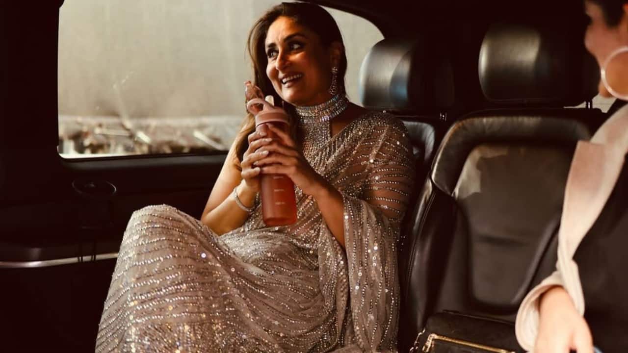 Inside the car In one candid shot, Kareena is seen sitting inside a luxury car, holding a drink bottle and flashing a radiant smile. In contrast to her red carpet glitz, the laid-back moment showcased her inherent charm. She reminded fans why she is still considered Bollywood's most stylish icon by exuding effortless poise while wearing a sparkling saree. Inside the car In one candid shot, Kareena is seen sitting inside a luxury car, holding a drink bottle and flashing a radiant smile. In contrast to her red carpet glitz, the laid-back moment showcased her inherent charm. She reminded fans why she is still considered Bollywood's most stylish icon by exuding effortless poise while wearing a sparkling saree.