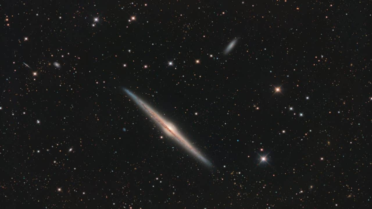 Galaxy on Edge: NGC 4565, the Needle Galaxy, is an edge-on spiral with a bright core, dust lanes, and spans 100,000 light-years, about the Milky Way’s size. (Image: NASA)