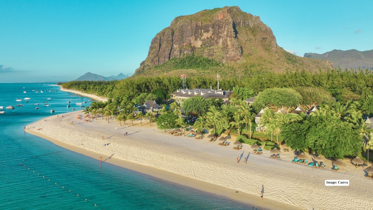 2. Le Morne, Mauritius This UNESCO-listed peninsula in Mauritius dazzles with turquoise lagoons and a famous “underwater waterfall” illusion. Towering cliffs backdrop calm seas, making it one of the most photogenic—and spiritually significant—beaches in the Indian Ocean. (Image: canva)