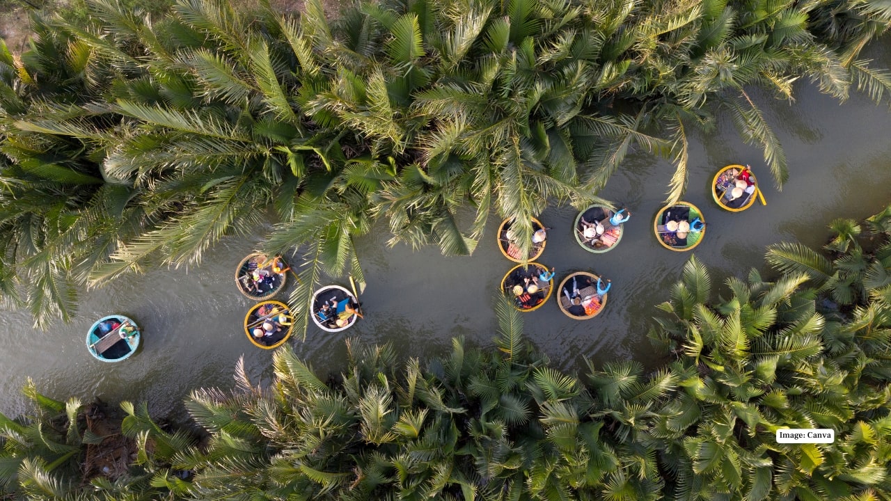 6. Cam Thanh, Vietnam – A Village of Rivers and Palms Cam Thanh is a quiet escape surrounded by coconut forests and winding rivers. Hop into a basket boat for a ride through this watery maze, and experience the peaceful rhythm of rural Vietnamese life.(Image: Canva)