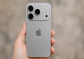 How many weeks of work does it take to buy an iPhone in India?